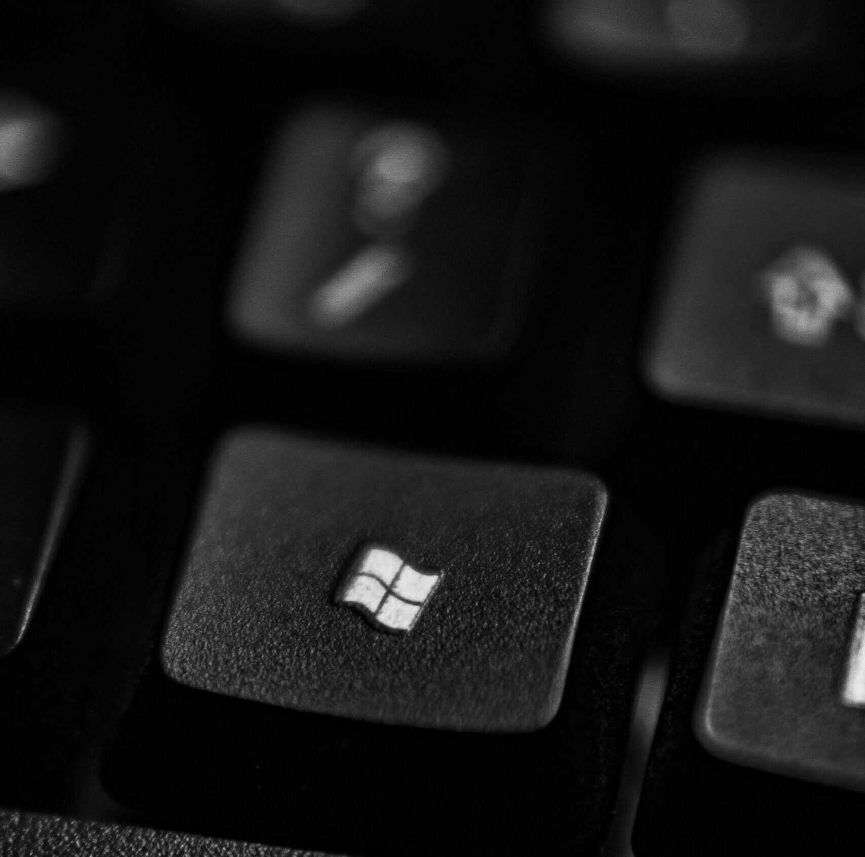 Close-up of a keyboard with focus on the Windows key, representing email security solutions.